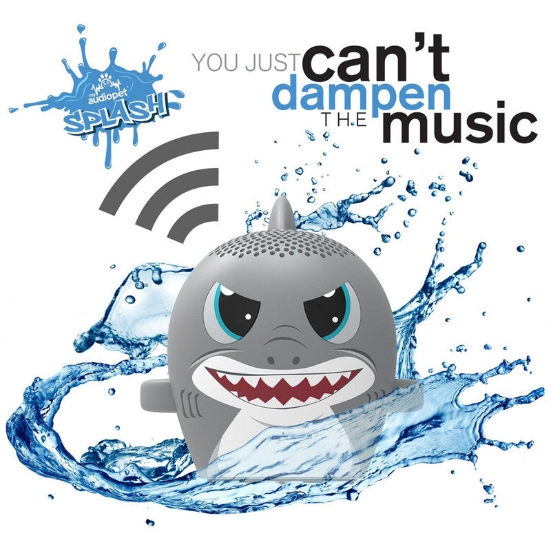 My Audio Pet Splash shark-shaped Bluetooth speaker in gray with blue and white accents surrounded by splashing water
