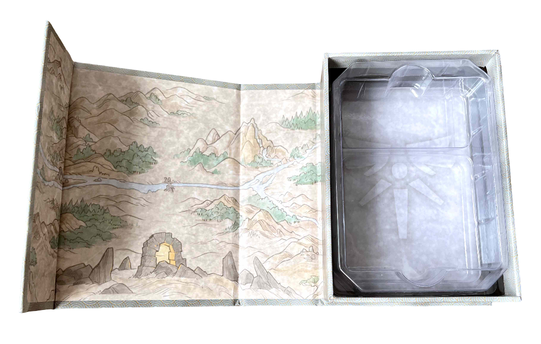 An open Summoner Wars - Second Edition Deluxe Deck Boxes Set 1 box with a fantasy map on the left and a clear plastic insert on the right
