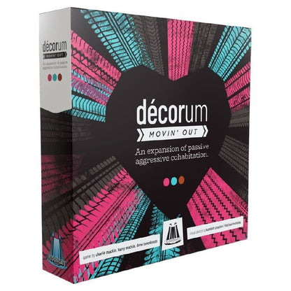 Décorum Movin' Out Expansion board game box with a heart-shaped design and radiating pink, turquoise, and grey tire tracks on a black background