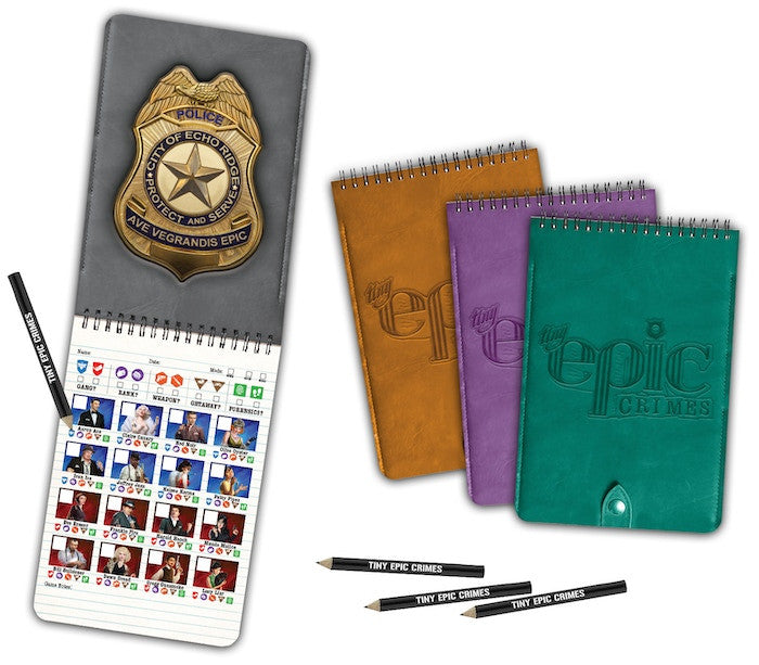 Front view of the Tiny Epic Crimes: Detective Notebooks (4 Pack) game accessory box featuring bold artwork of a city skyline, magnifying glass, and crime scene visuals