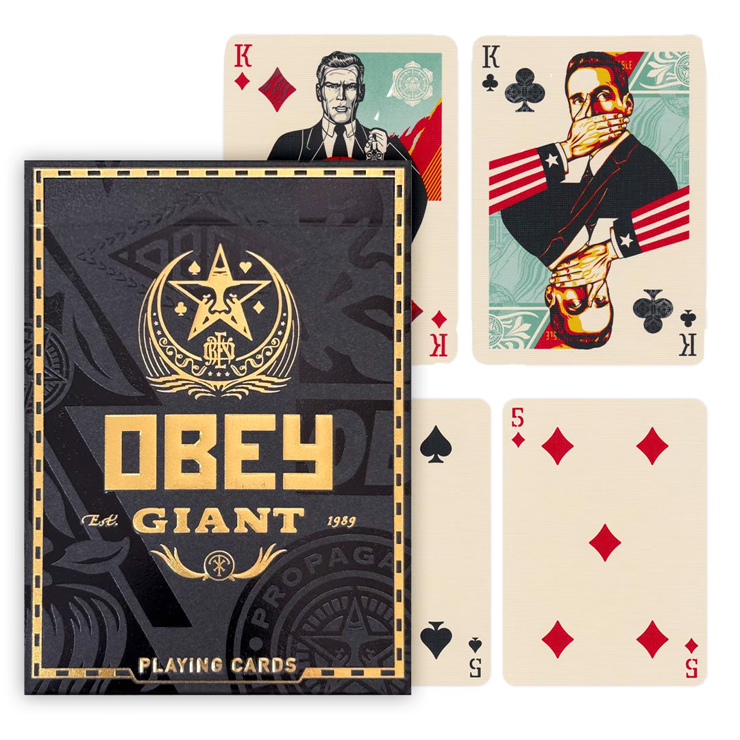 OBEY Giant playing cards, showing the black and gold box and custom King cards with graphic, stylized propaganda artwork
