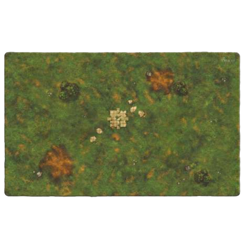 An aerial view of the rectangular Onus Traianus Meadow playmat showing green and brown grassland surrounding a small central ruin and large dirt patches