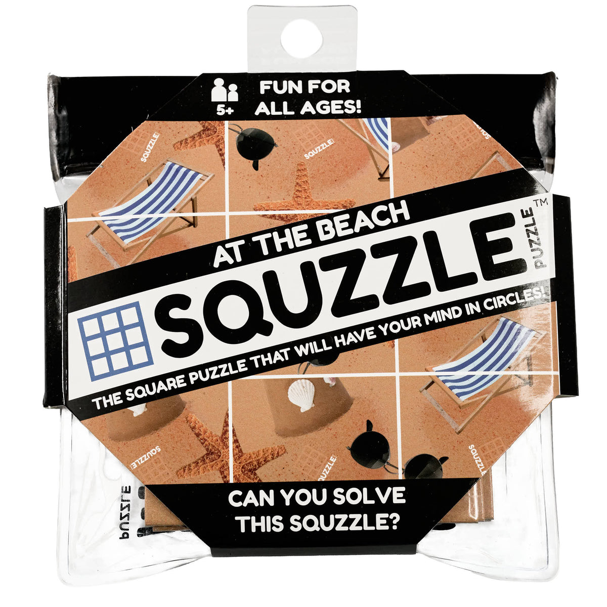 The Fun Squared Games Squzzle Puzzle "At The Beach" is shown in its clear and black retail package, featuring nine squares with beach chairs, starfish, and sunglasses