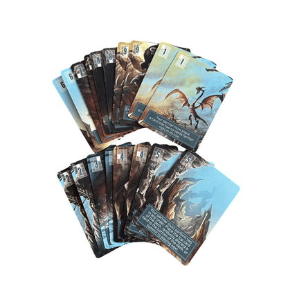 Two fanned stacks of fantasy-themed game cards featuring illustrated dragons and numbered corners are displayed against a clean white background