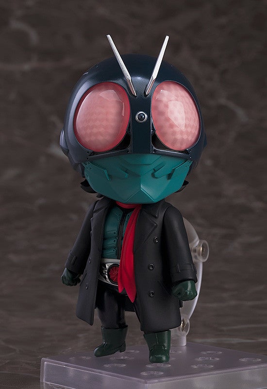Nendoroid Kamen Rider holding red scarf in action stance