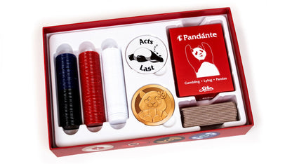 Open game box showing organized trays with cards and tokens inside