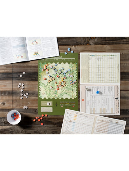 A historical wargame, "Into the Woods," set up on a wooden table with its map board, many colorful counters and rulebooks