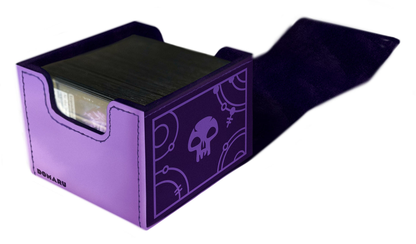 A light purple Gatherers Tavern Domaru deck box standing open and packed with sleeved trading cards, showcasing a dark mystical skull design