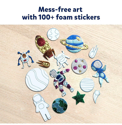 An array of colorful, textured foam and foil stickers featuring astronauts, stars, planets, and rockets arranged on a light wood table with overlaid marketing text