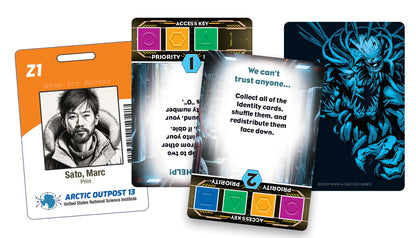 A spread of Frozen Horror game components including the Arctic Outpost 13 ID card, two futuristic action cards, and a dark card depicting a glowing blue monster