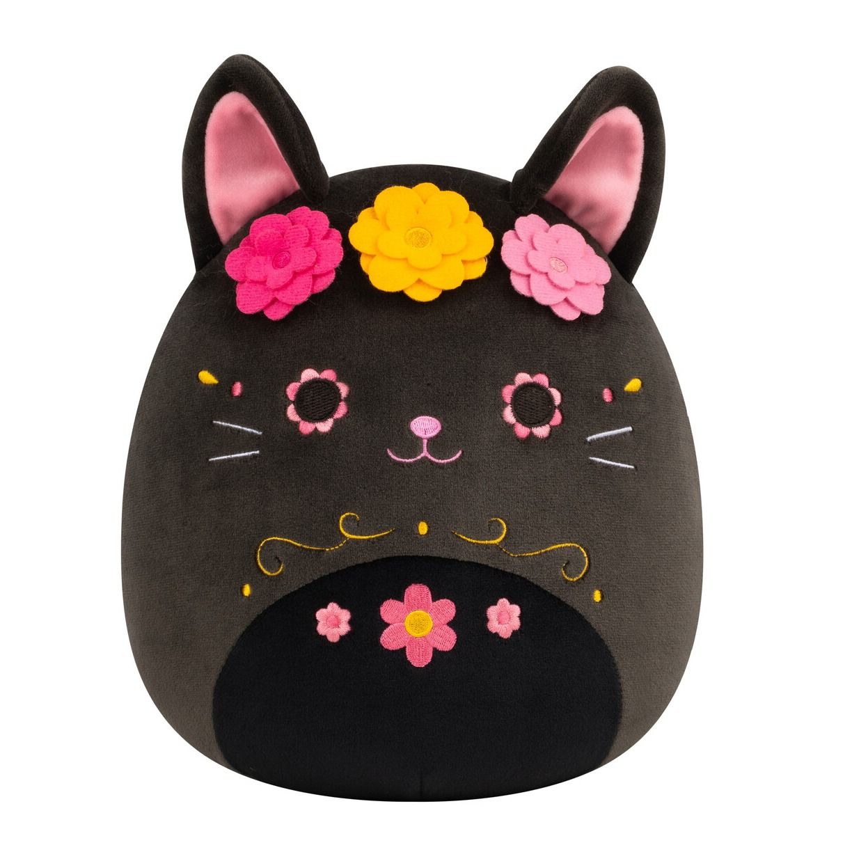 Black 8-inch Squishmallow cat plush decorated for Day of the Dead with pink ears embroidered calavera makeup and a felt floral crown