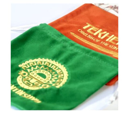 Contents of Loot Box #1 laid out with manuals and tokens