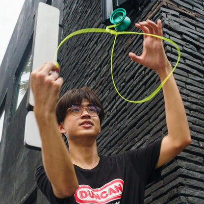 Boy playing with Duncan Expert Windrunner Yo Yo