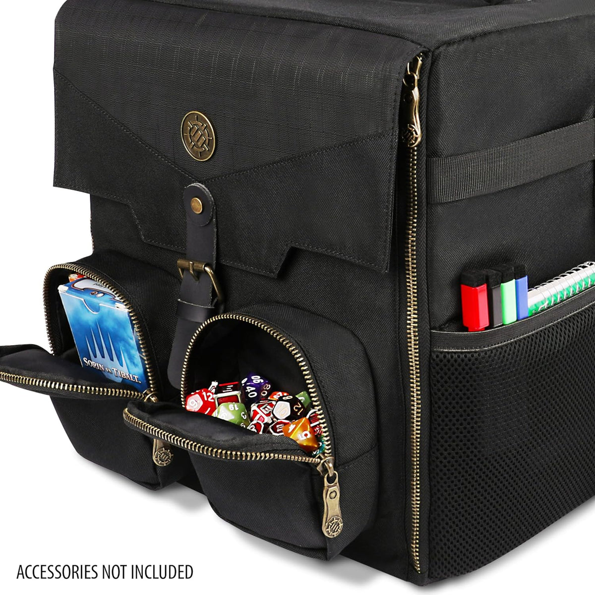 Black multi-pocket bag showing a card deck, colorful RPG dice, markers, and a notebook in open compartments.
