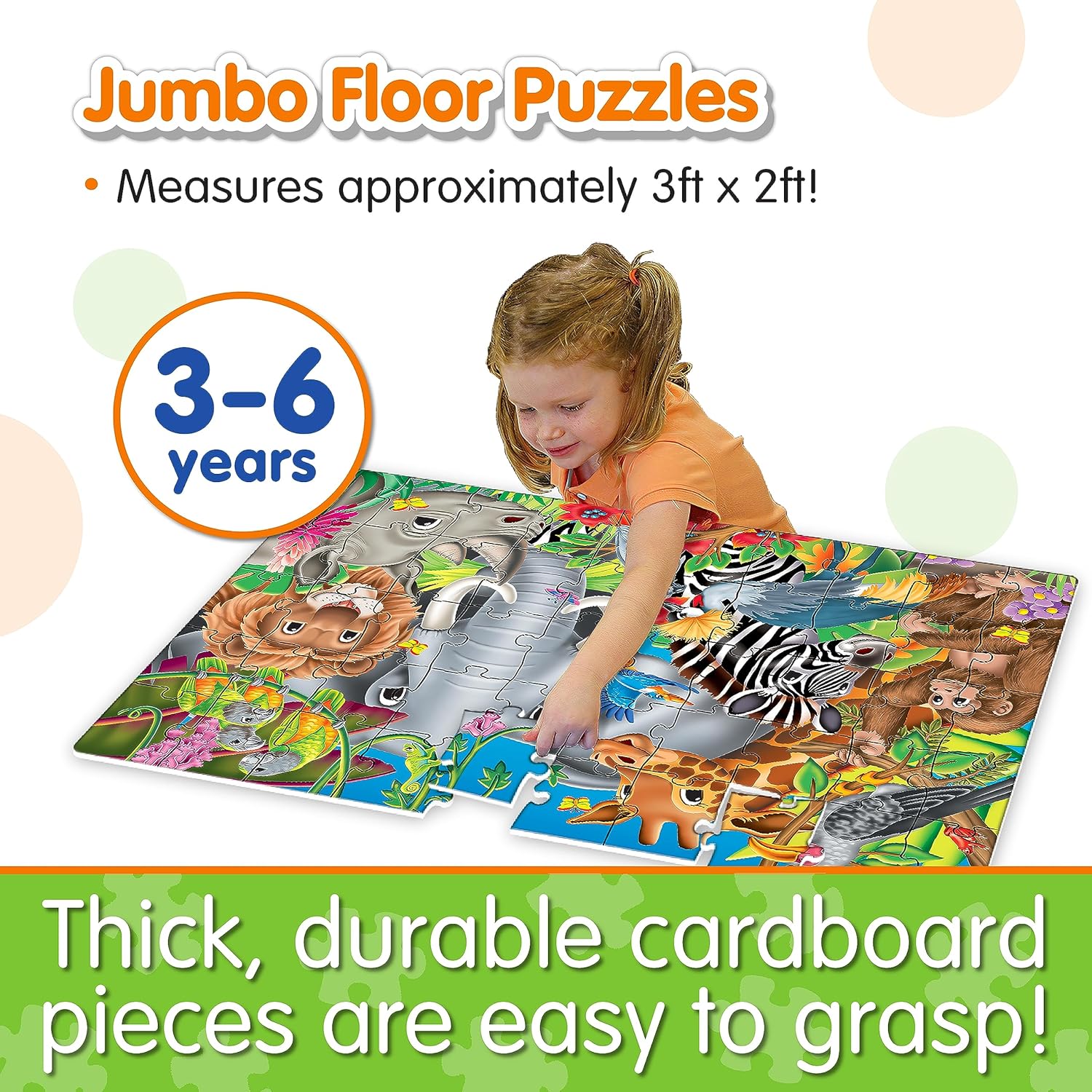 Young girl placing a piece into a large, colorful jungle animal floor puzzle