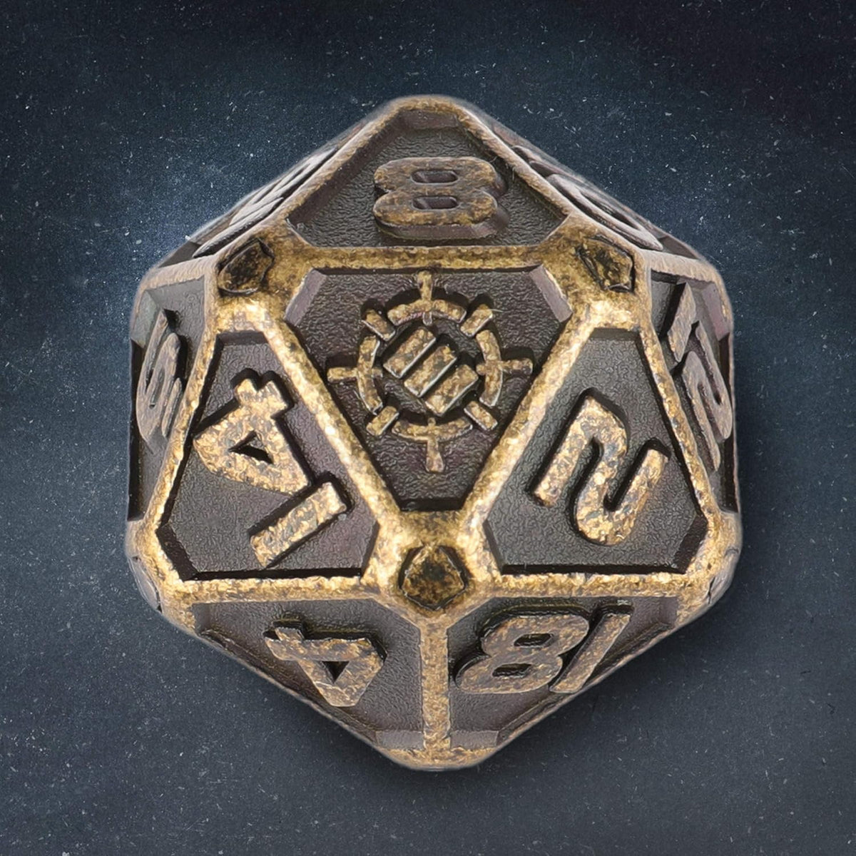 A metallic, aged bronze 20-sided die with numbers and a central gear-like symbol on a dark background