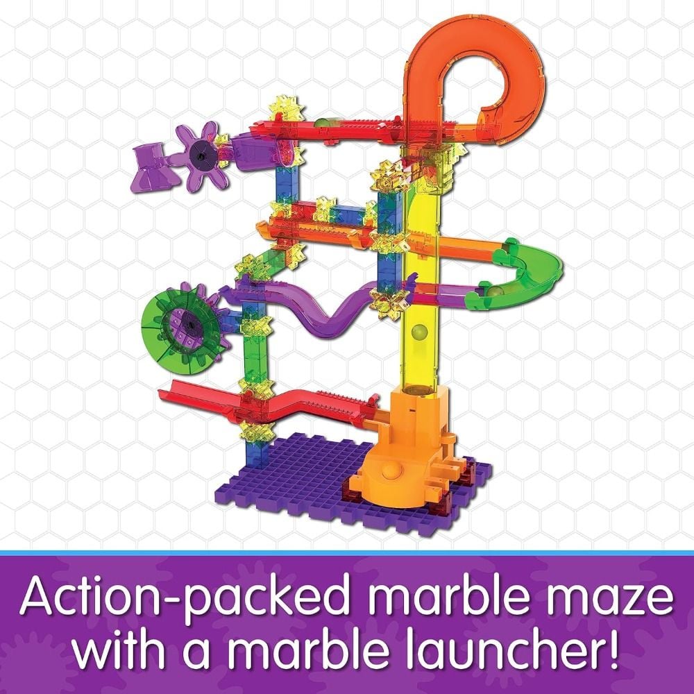 Colourful transparent marble run maze toy kit with loops, track pieces, gears, and a launcher base on a purple grid