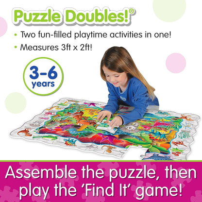 A young girl assembling a large, colorful floor puzzle featuring cartoon creatures