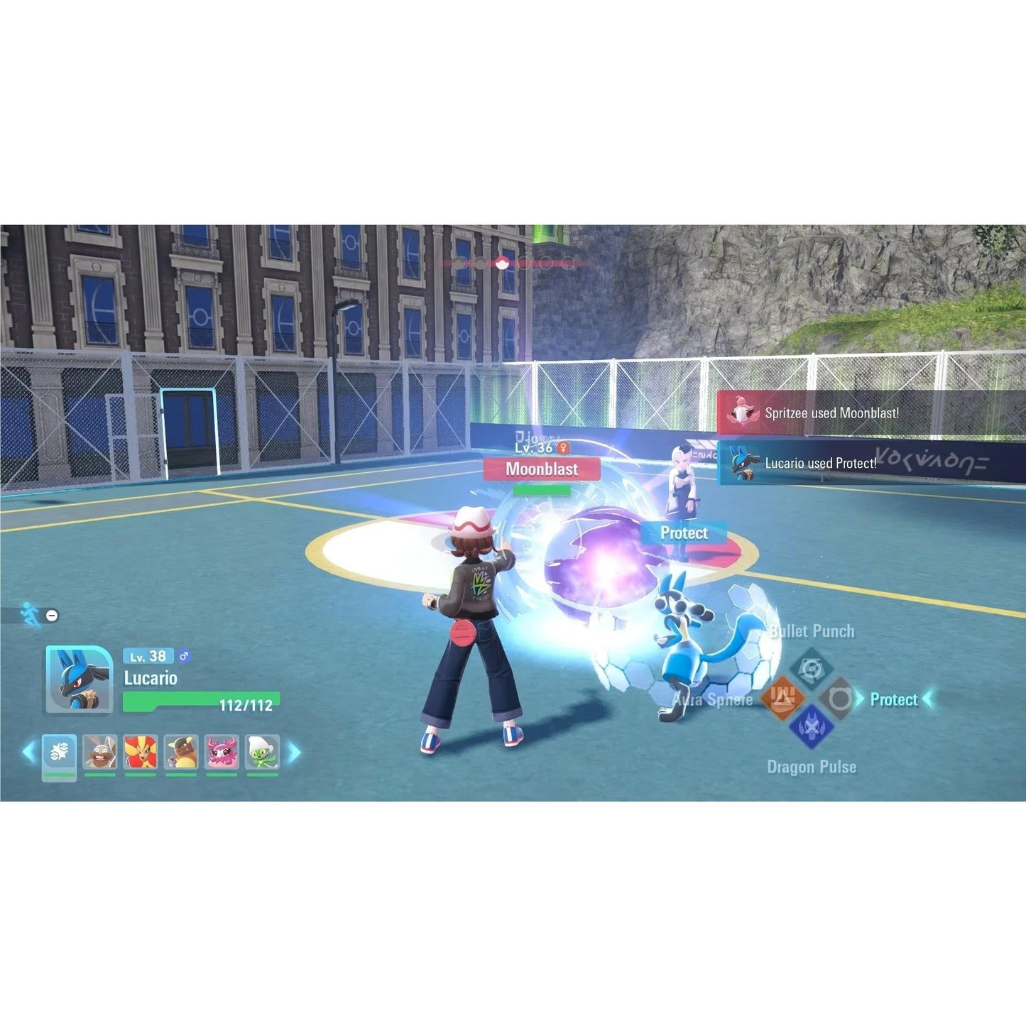 Gameplay footage of Pokémon Legends Z-A featuring a level 38 Lucario protecting itself from a Moonblast attack on an outdoor battlefield