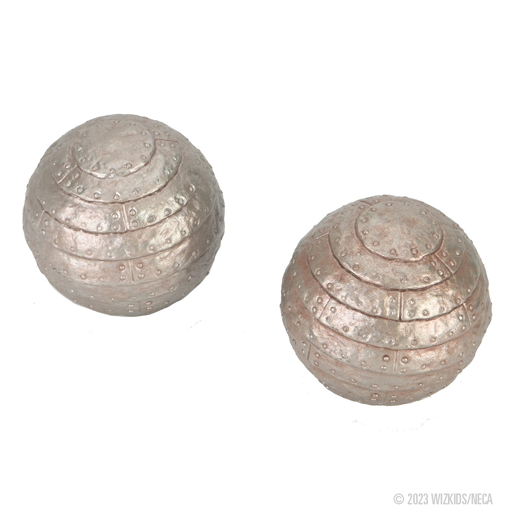 Two metallic spheres with segmented, riveted concentric bands