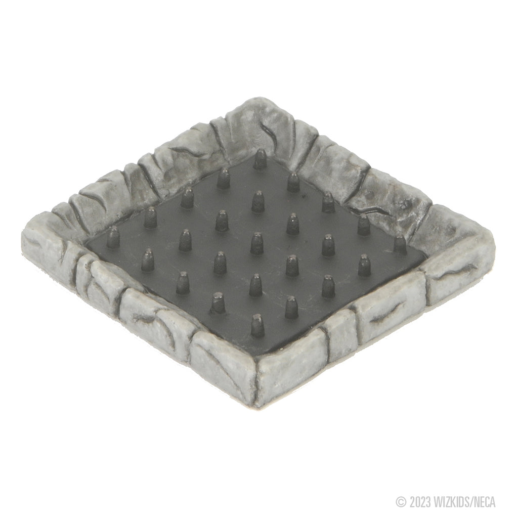 A miniature square grey stone dungeon tile with a dark, spiked floor, depicting a spike trap