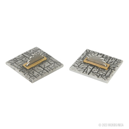 Two grey stone dungeon tiles, each with an upright silver saw blade in a gold base