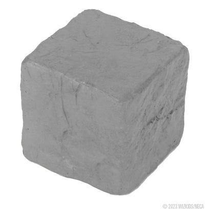 A rough, Grey cube-shaped block with a textured, stone-like surface, on a white background