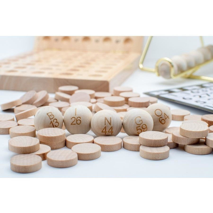 A wooden LPG Classics Bingo Set with numbered balls B 13, I 26, N 44, G 59, O 64, chips, and a board in the background