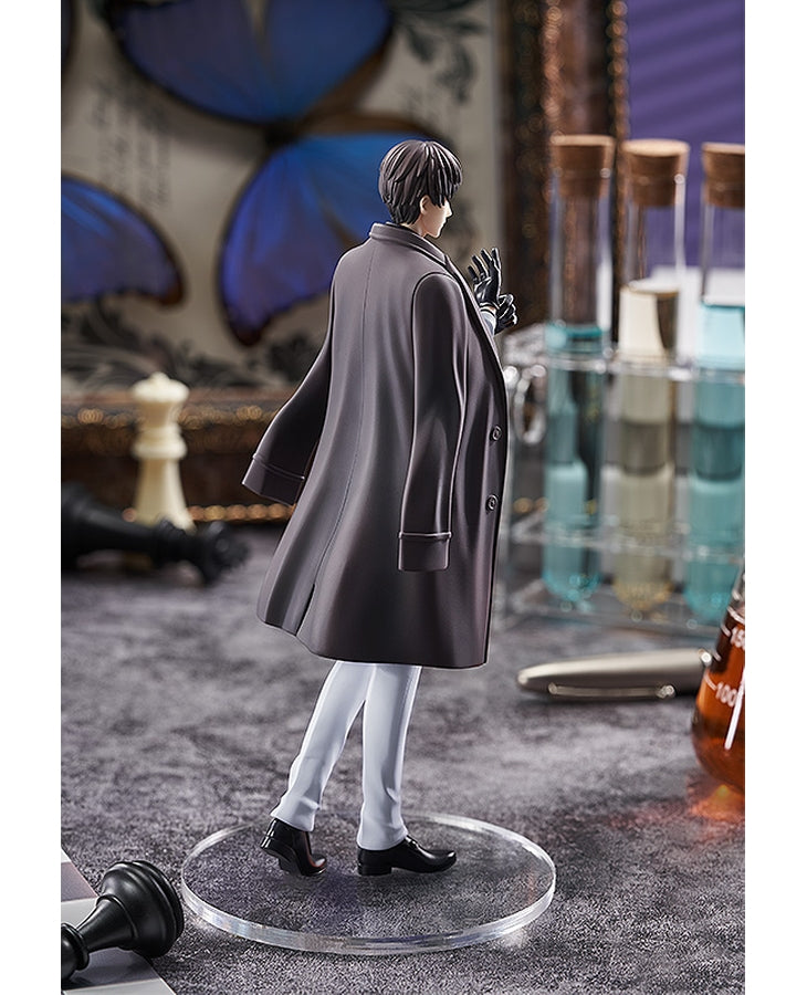 Anime figure of character with black coat white pants and black gloves standing