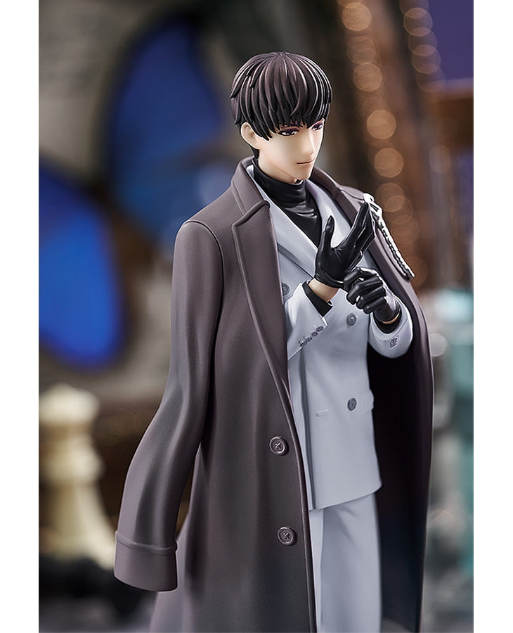 Anime figure of a character with black hair and purple eyes wearing a light gray suit black turtleneck