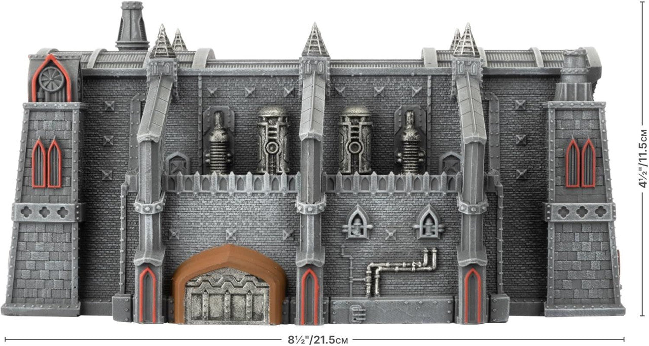 A grey miniature Manfactorium Depot building with gothic spires, arched windows with red frames, industrial pipes, and a large entrance, shown against a white background