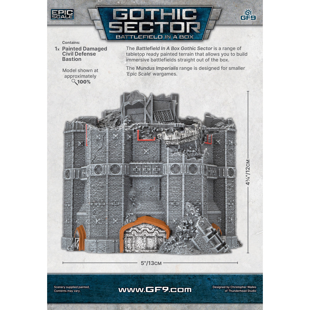 A damaged Gothic Sector Civil Defense Bastion model shows a grey stone building with gothic details, an orange archway, and significant rubble on its upper levels