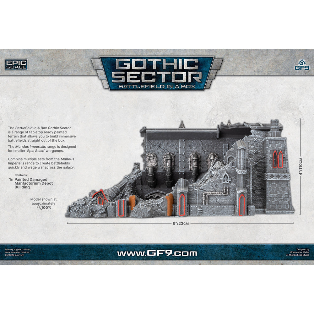A painted tabletop model of a damaged gothic Manufactorium Depot building with grey walls, broken sections, and red windows