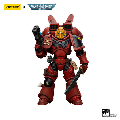 A red armored collectible figure with a yellow helmet, jump pack, holding a plasma pistol and a sword