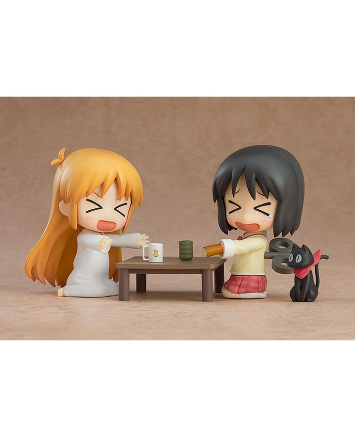 Rear view of Nendoroid Hakase showcasing her lab coat and orange hair ribbon