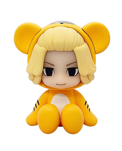 Chocot Manjiro Sano figure sitting on chocolate bar with cheerful expression