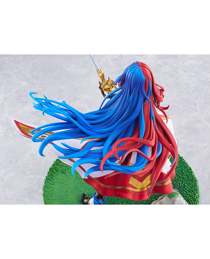 A figurine of a warrior with flowing red and blue hair and a red cape, holding a sword and lunging forward on a grassy mound