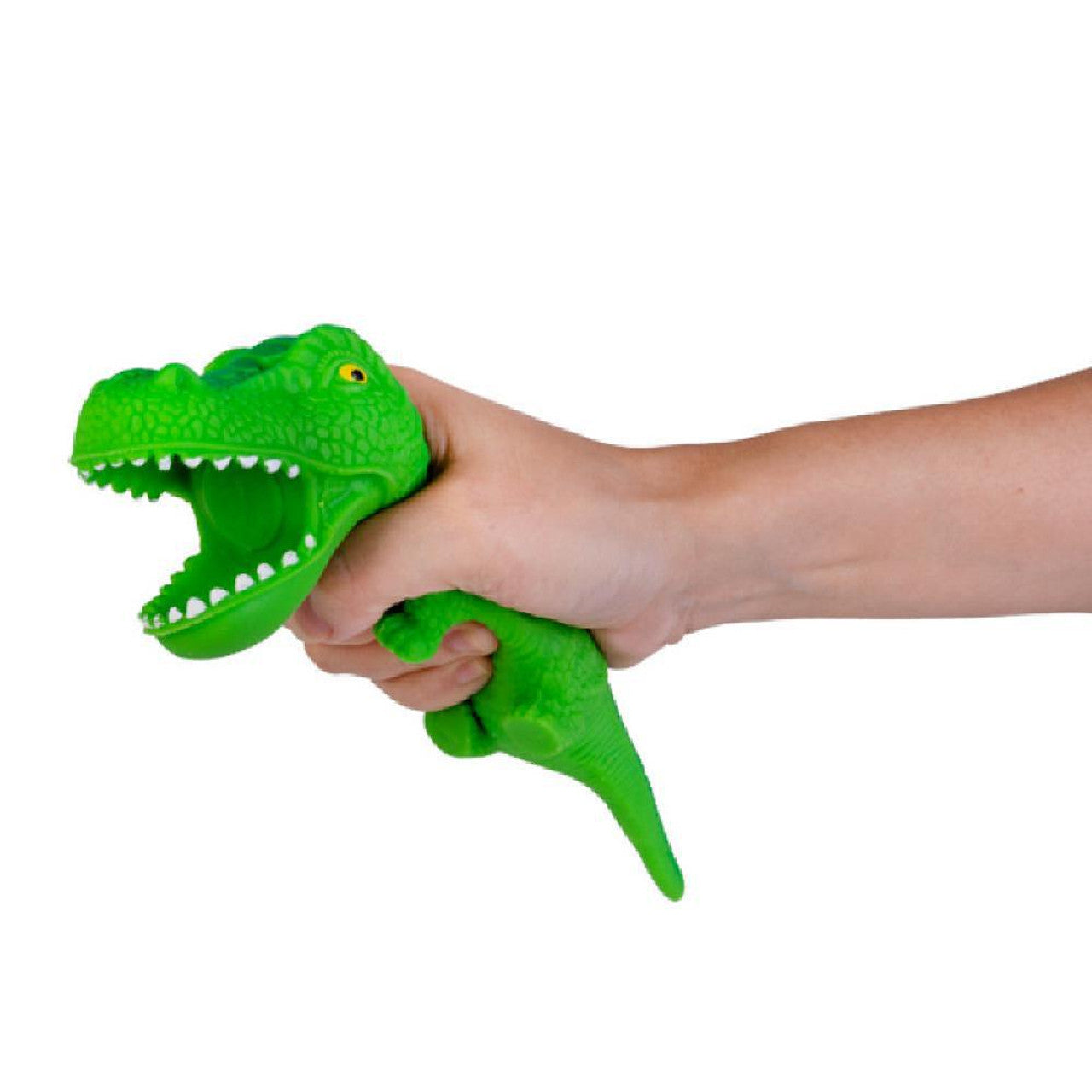 Hand squeezing a green T-Rex toy puppet, forcing its large, toothy mouth open