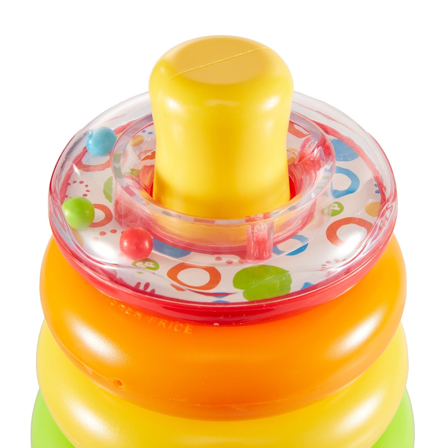 A yellow central post holds colored rings; the top clear ring contains colorful rattling beads