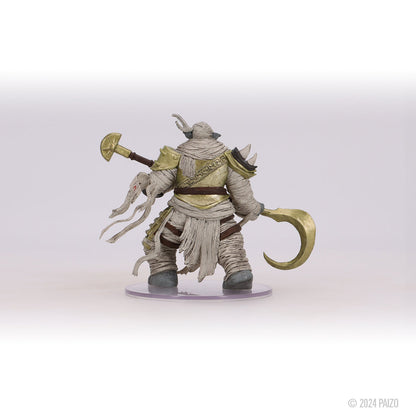 Heavily bandaged fantasy miniature with gold armor, holding a mace and a curved scythe, viewed from the back