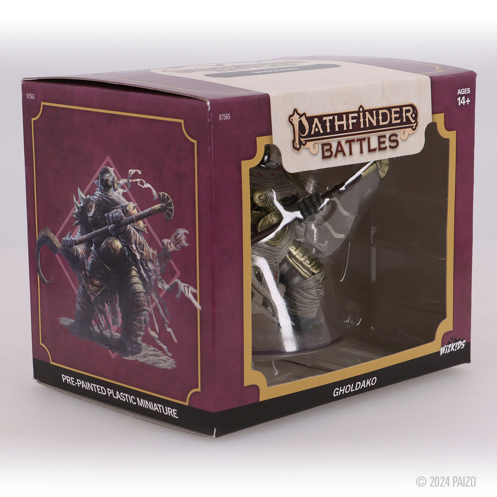 Boxed Pathfinder Battles 'Gholdako' pre-painted miniature. A robed, monster-like figure holding a large polearm is visible inside