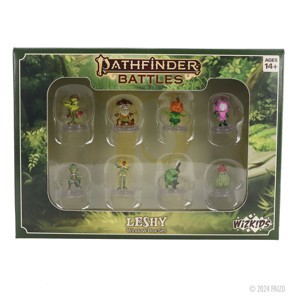 A green &quot;Pathfinder Battles Leshy&quot; box showcasing 8 distinct plant-creature miniatures through a clear window