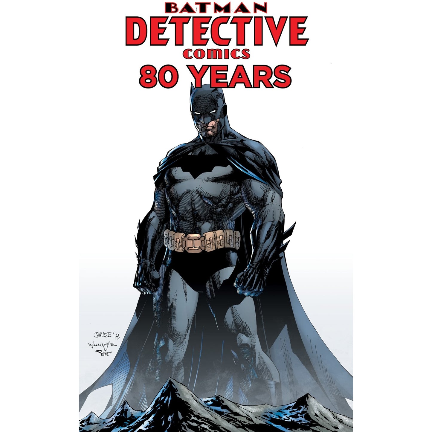 The cover of Detective Comics 80 Years of Batman Deluxe Edition graphic novel features a strong Batman in dark suit and flowing cape standing on rocky terrain