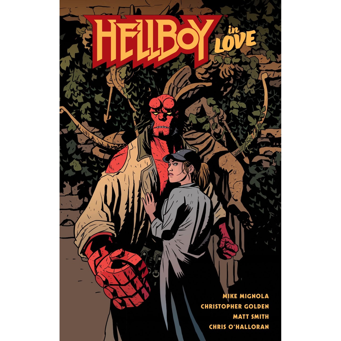 Comic cover: Red-skinned Hellboy in a trench coat stands with a woman in a cap, her hand on his chest. Title: HELLBOY in LOVE