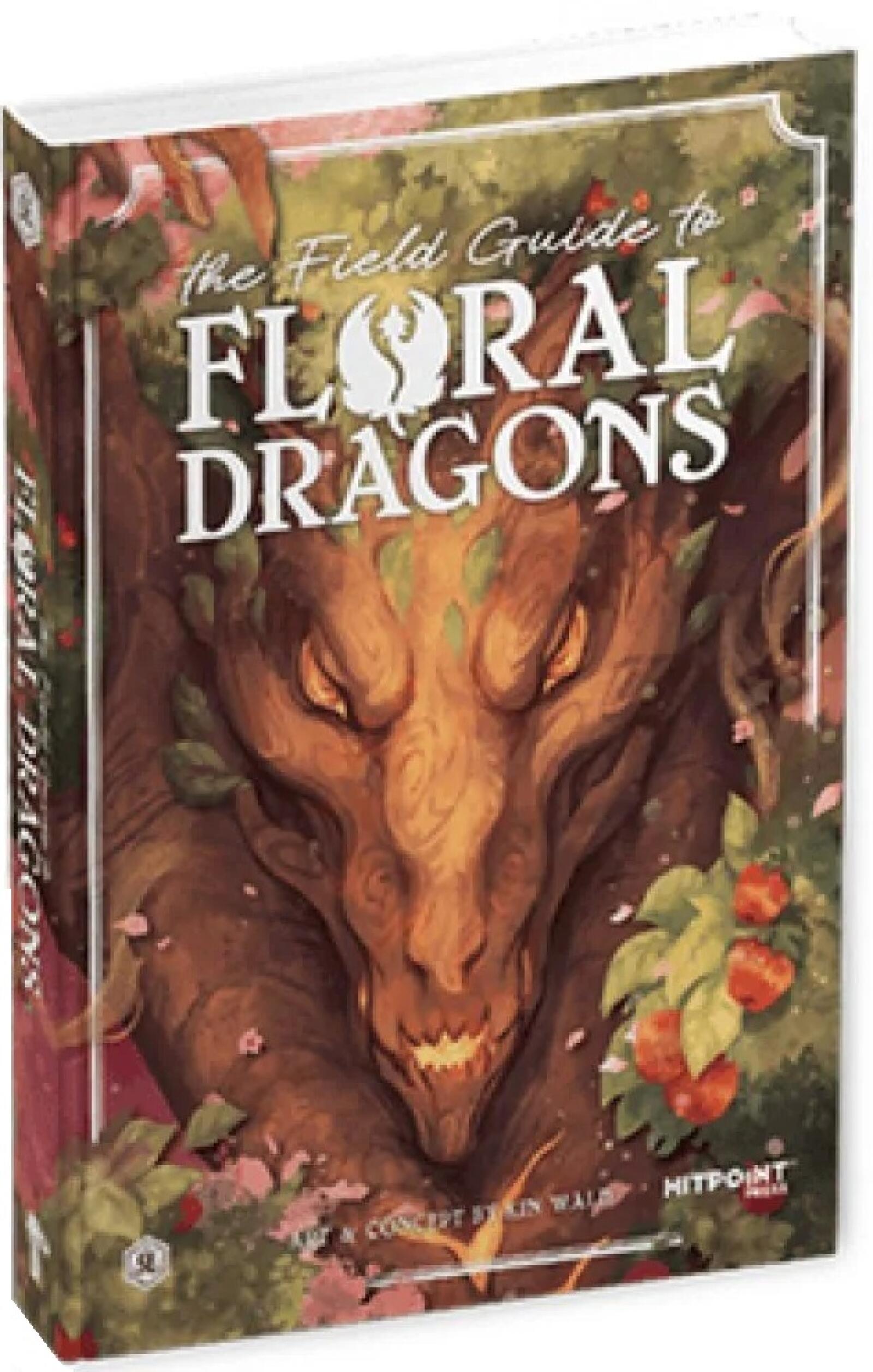 A book titled "The Field Guide to Floral Dragons" featuring a tree-like dragon head with glowing eyes surrounded by foliage and berries