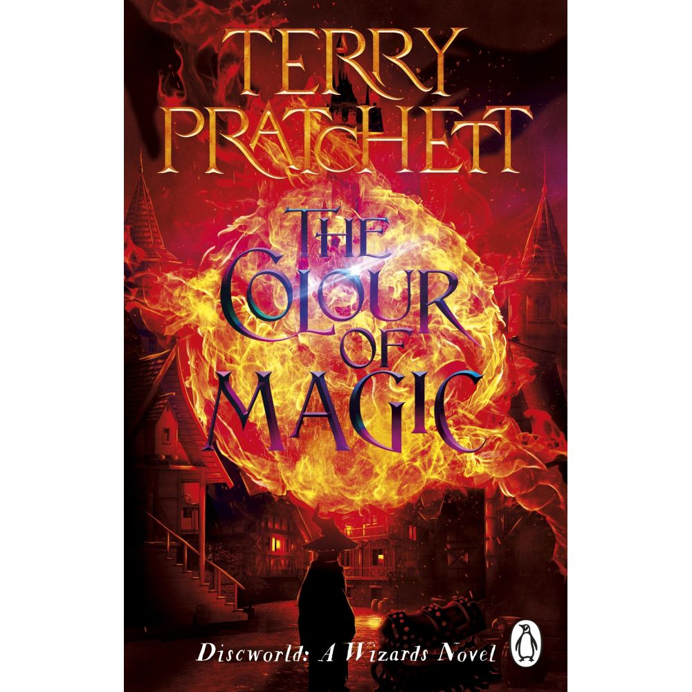 Terry Pratchett's 'The Colour of Magic' book cover, a wizard and the Luggage stand before a fantasy town engulfed by a massive fiery explosion