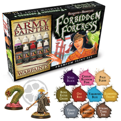 Flying Frog Shadows of Brimstone Forbidden Fortress Paint Set box shows a warrior, paint bottles, a brush, two miniatures, and ten labeled paint splatters