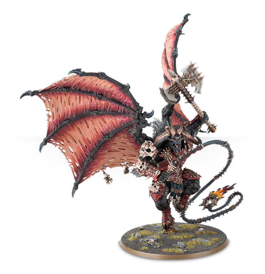 A painted Blades of Khorne Bloodthirster miniature with large tattered wings, horns, holding an axe and spiked whip, standing on a round base