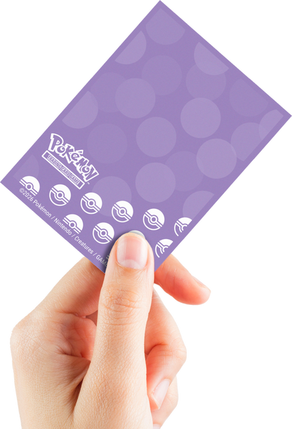 Pokémon TCG card sleeve held by a hand, showing the logo and Poké Ball icons