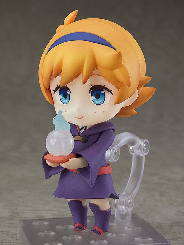 Nendoroid Lotte casting magic with wand and open book